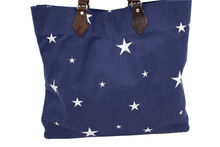 Load image into Gallery viewer, Navy tote bag with star motif and leather handles