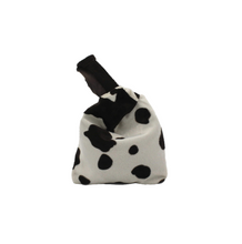 Load image into Gallery viewer, cow_print_wristlet_back